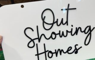 “Out Showing Homes” sign Custom "Out Showing Homes" sign with raised script lettering