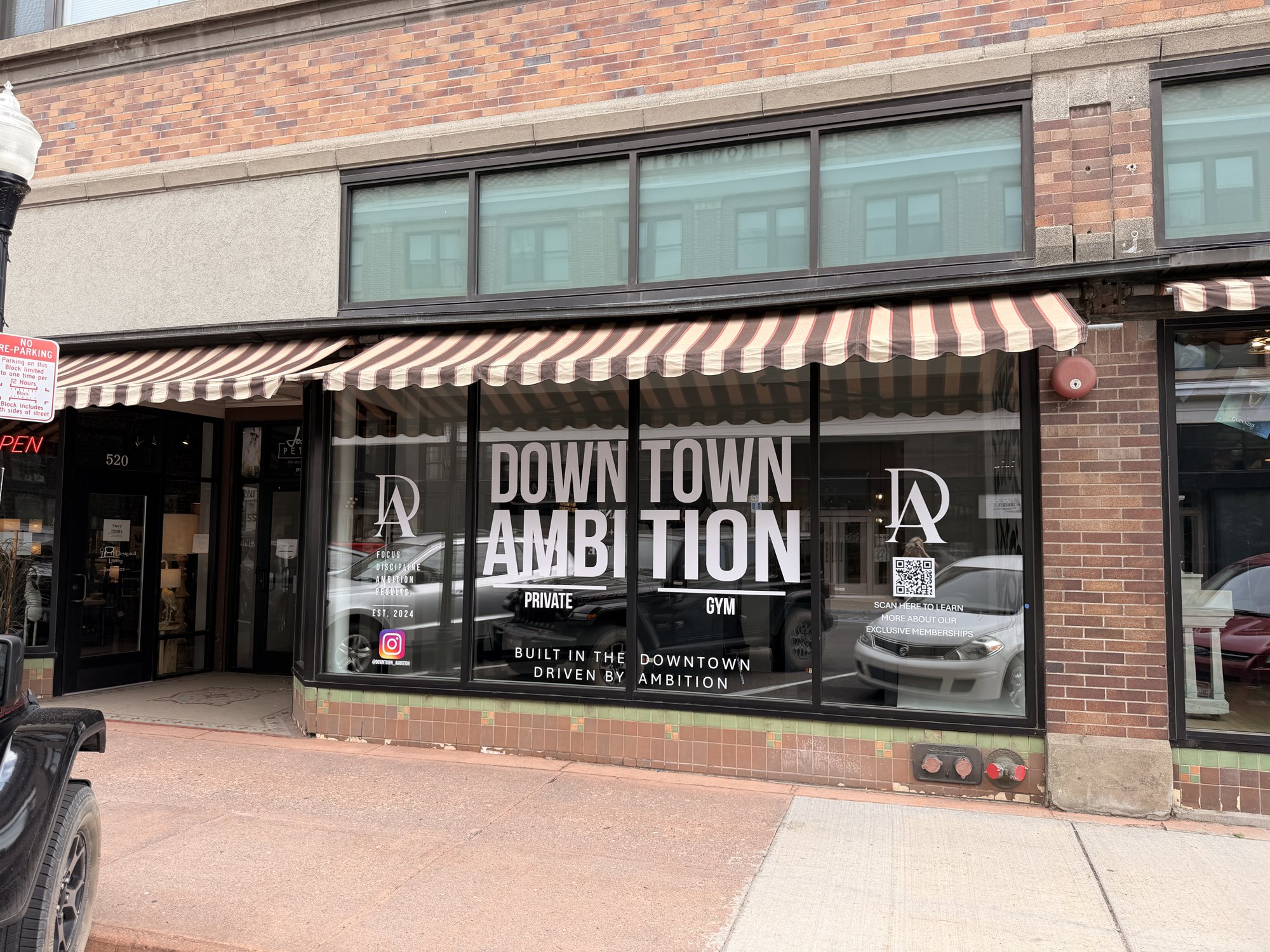 Downtown Ambition storefront window graphics Storefront window graphics for Downtown Ambition private gym